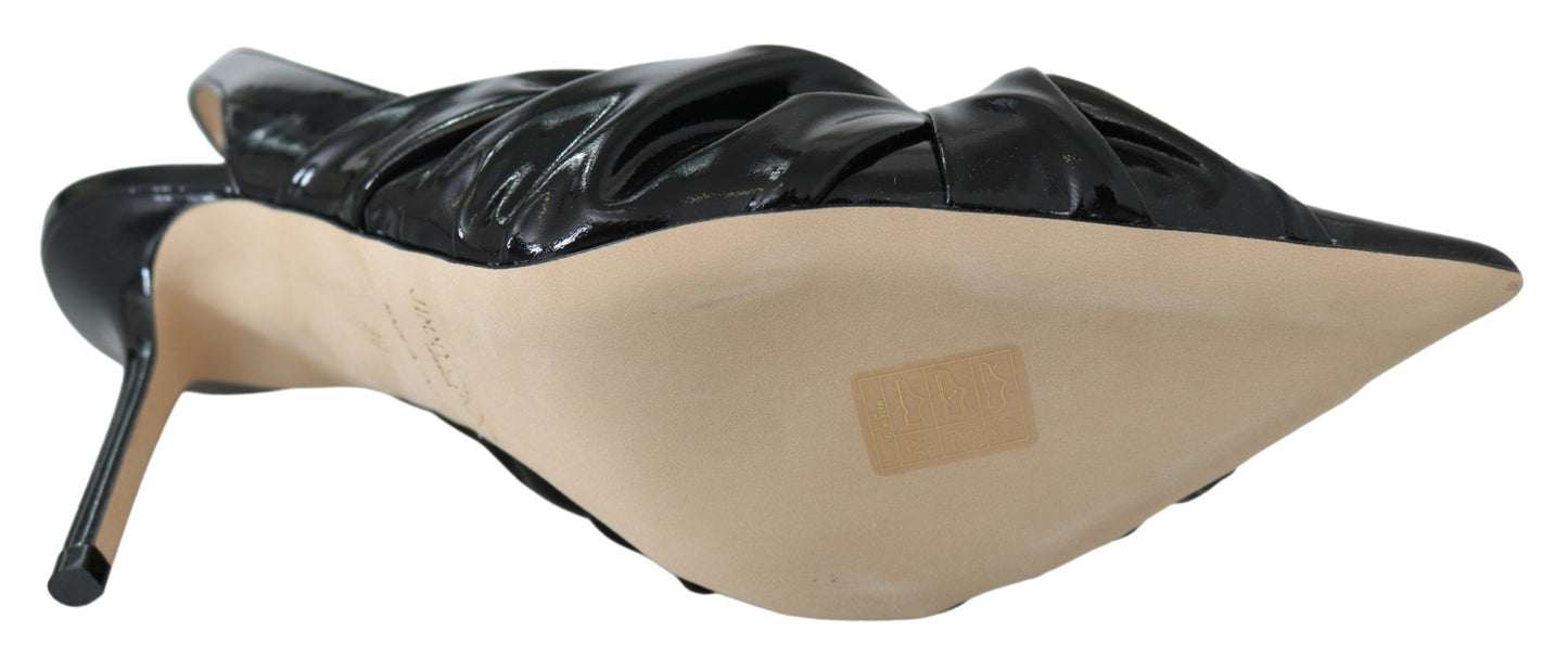 Jimmy Choo elegant black leather pumps with a pointed toe